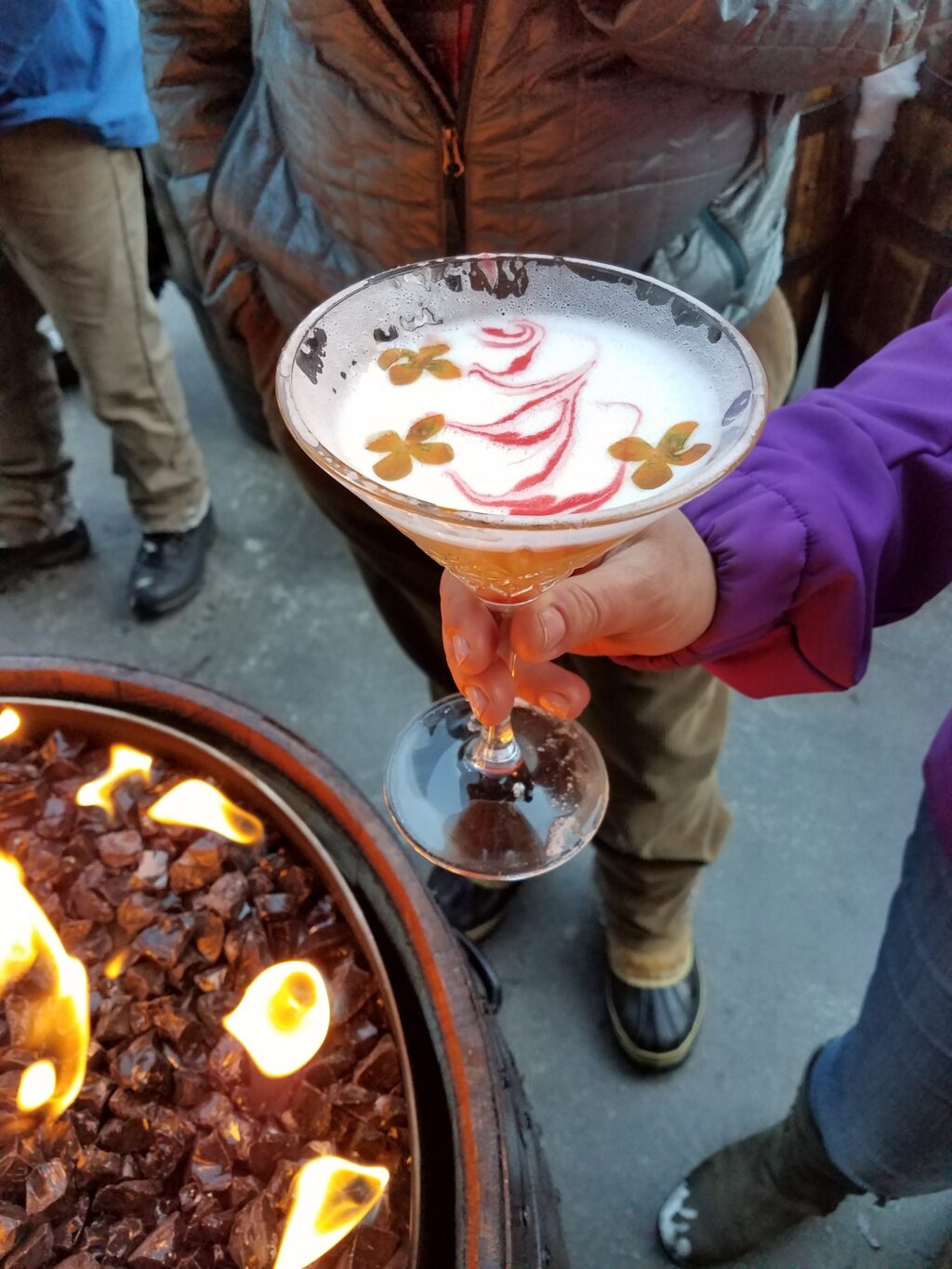 exotic mixed drink by a fire