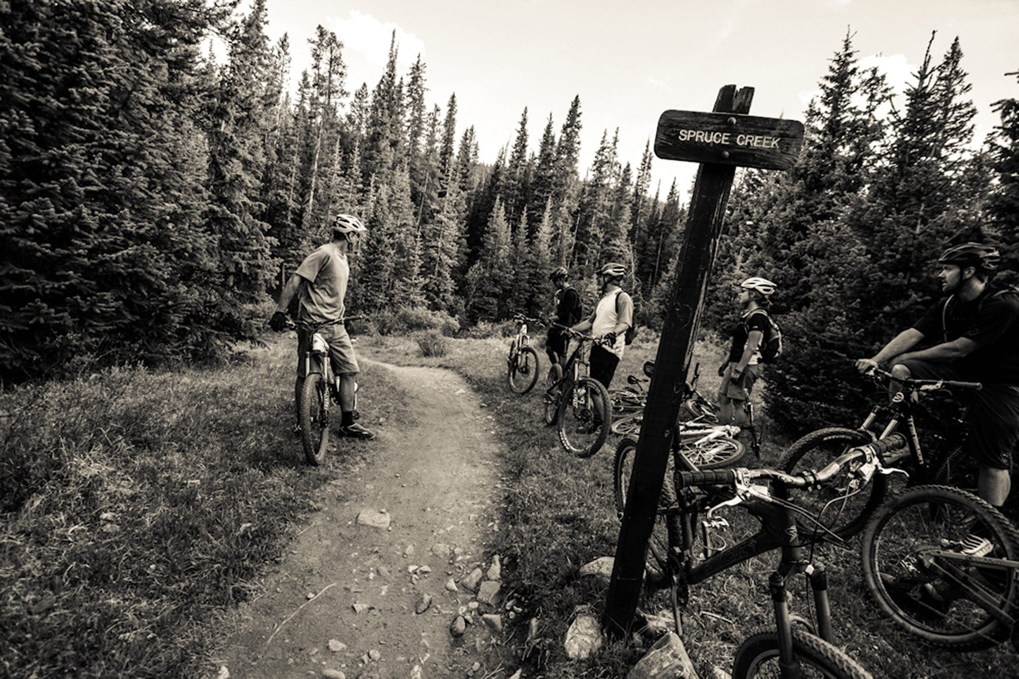 Riders on the Spruce Creek Trail, one of the difficult biking trails in Breckenridge.