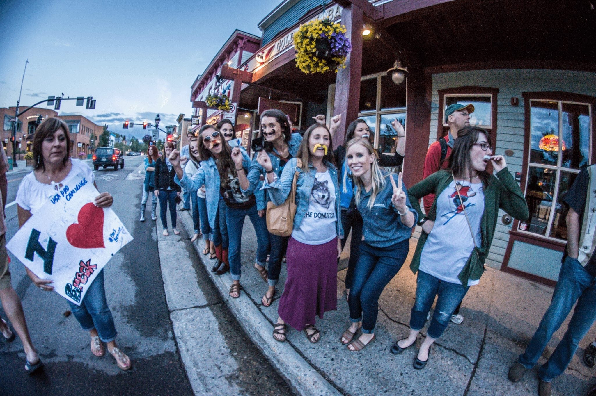 Group of girls celebrate at a parade