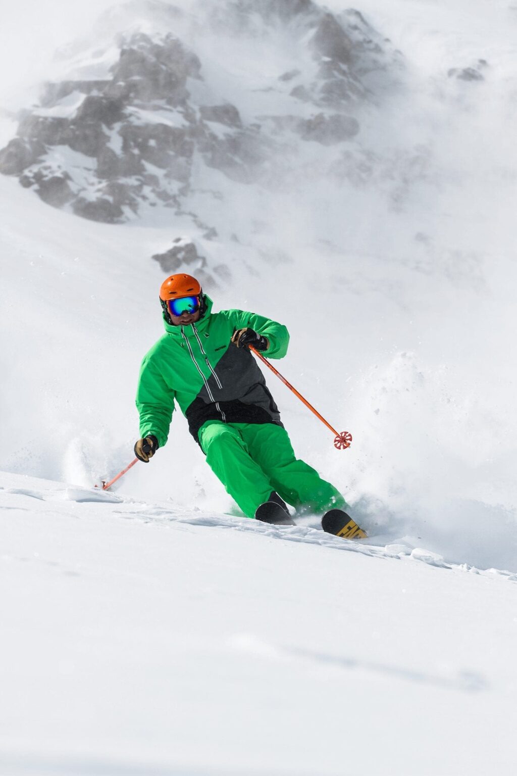 Backcountry skier skiing powder in Breckenridge.