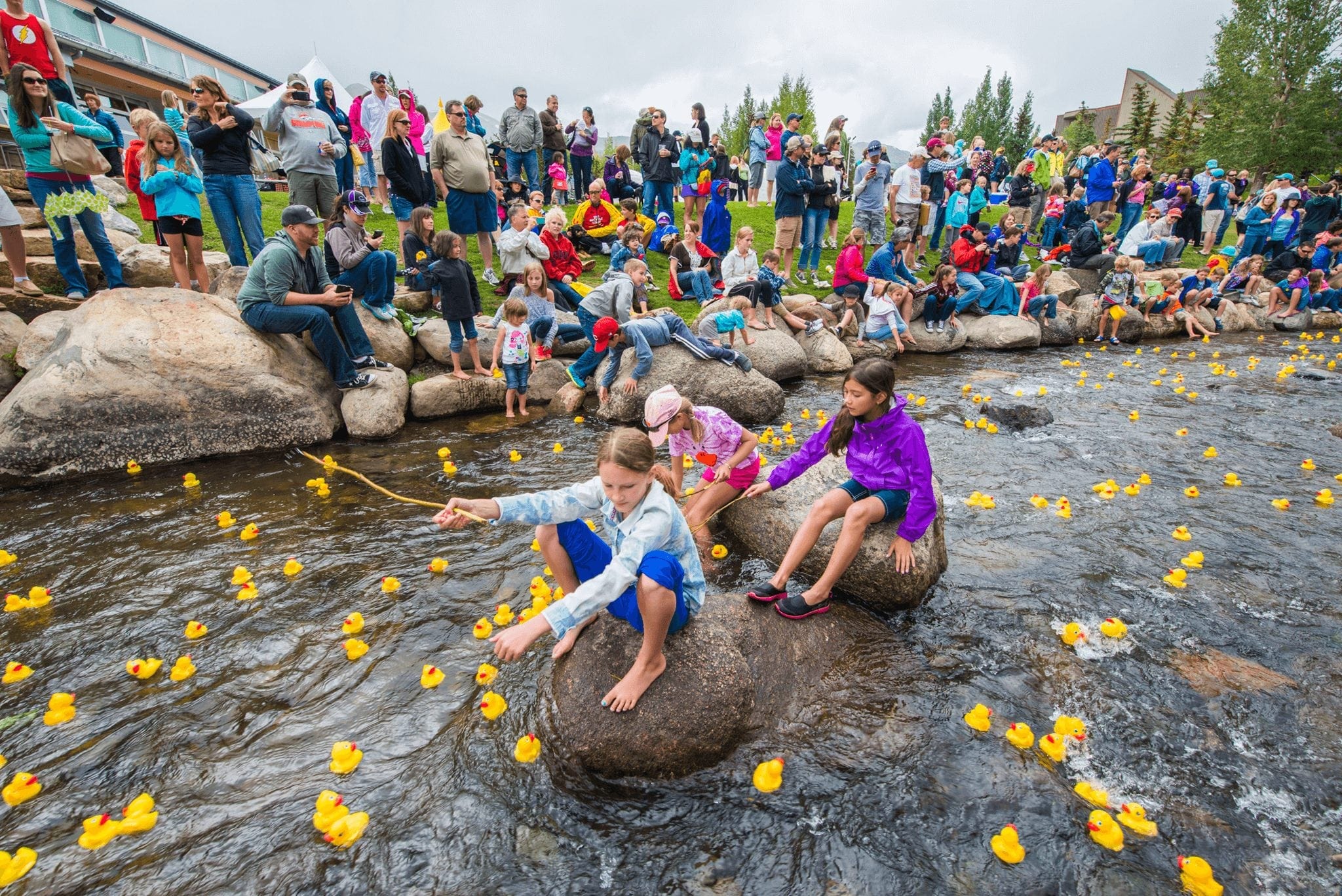 Breckenridge Duck Race Kids Fishing for Ducks in Blue River