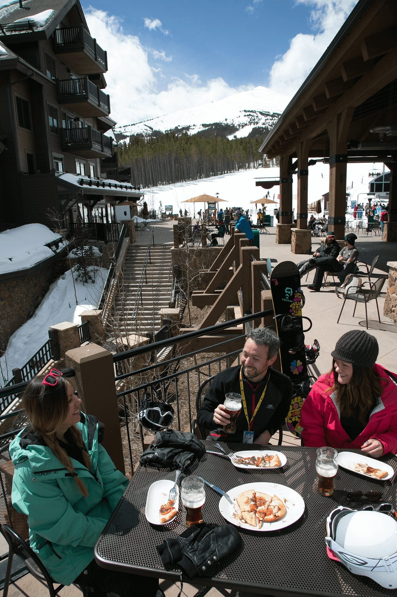 Friends sharing a meal after skiing on the mountain at Breckenridge Ski Resort