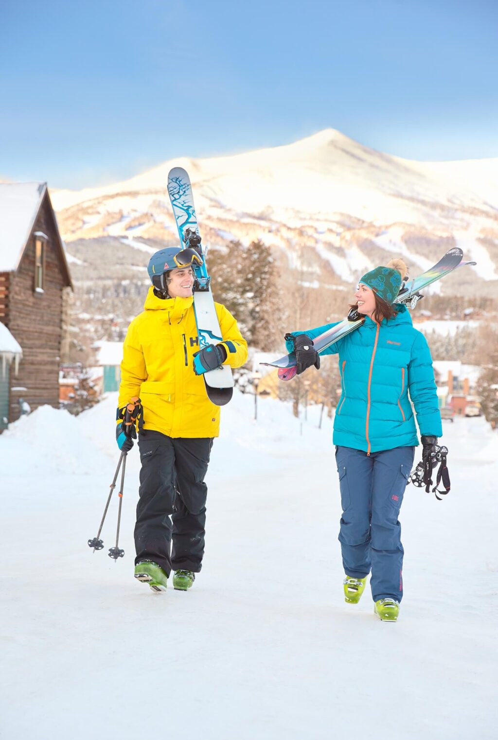 Friends walking through the snow after Skiing In Breckenridge, CO.