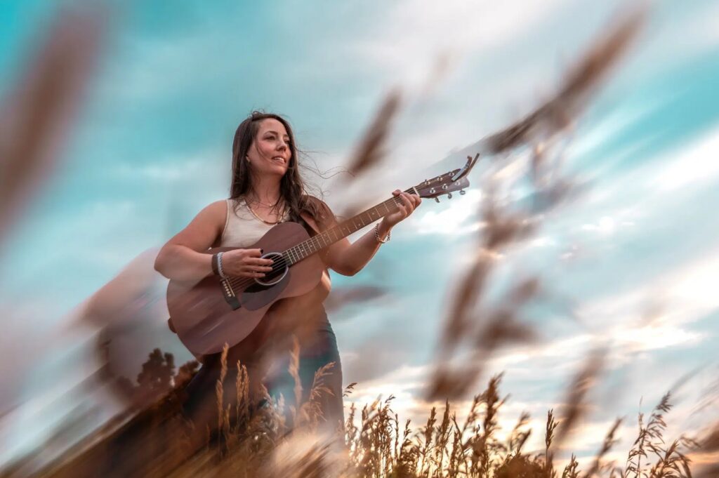 Woman playing guitar