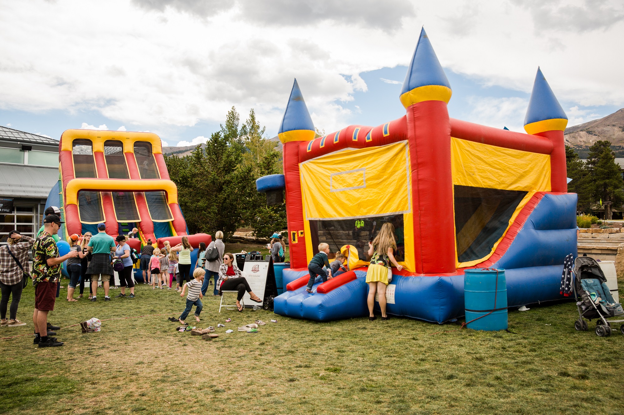 Kids playing in bounce houses