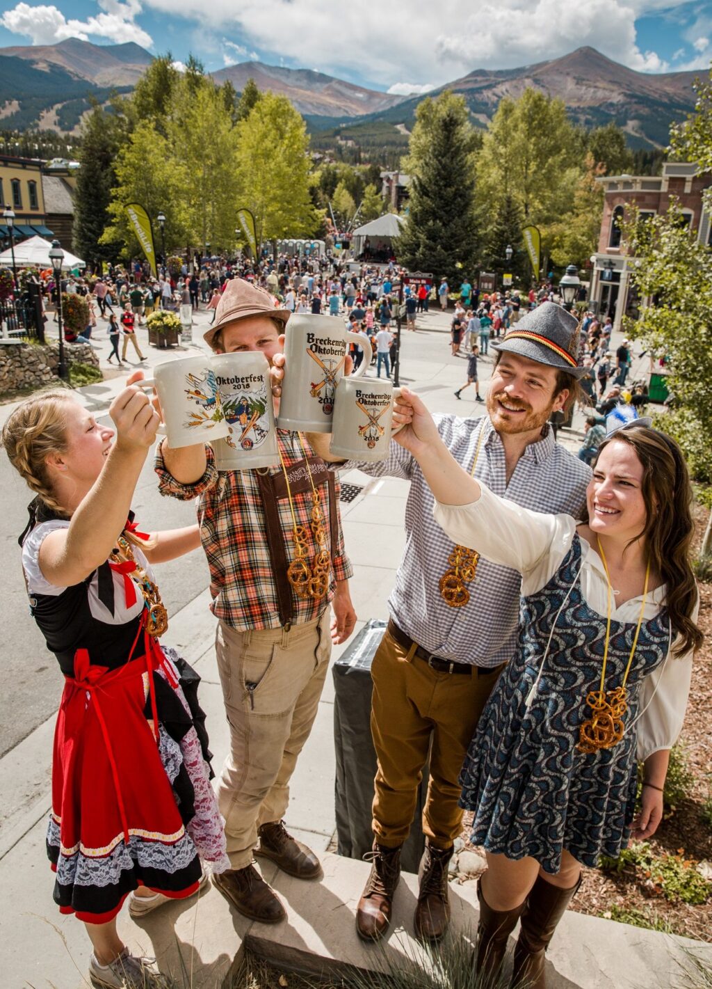 Group toasting their steins at Breckenridge Oktoberfest