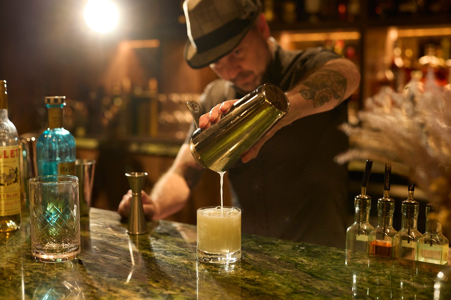 cocktail being poured at a bar in Breckenridge