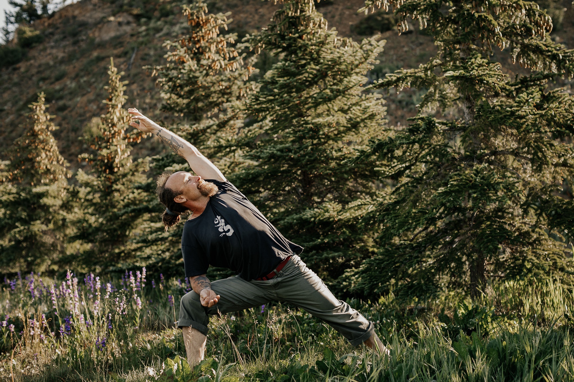 Man doing outdoor yoga with Bhava Yoga in Breckenridge