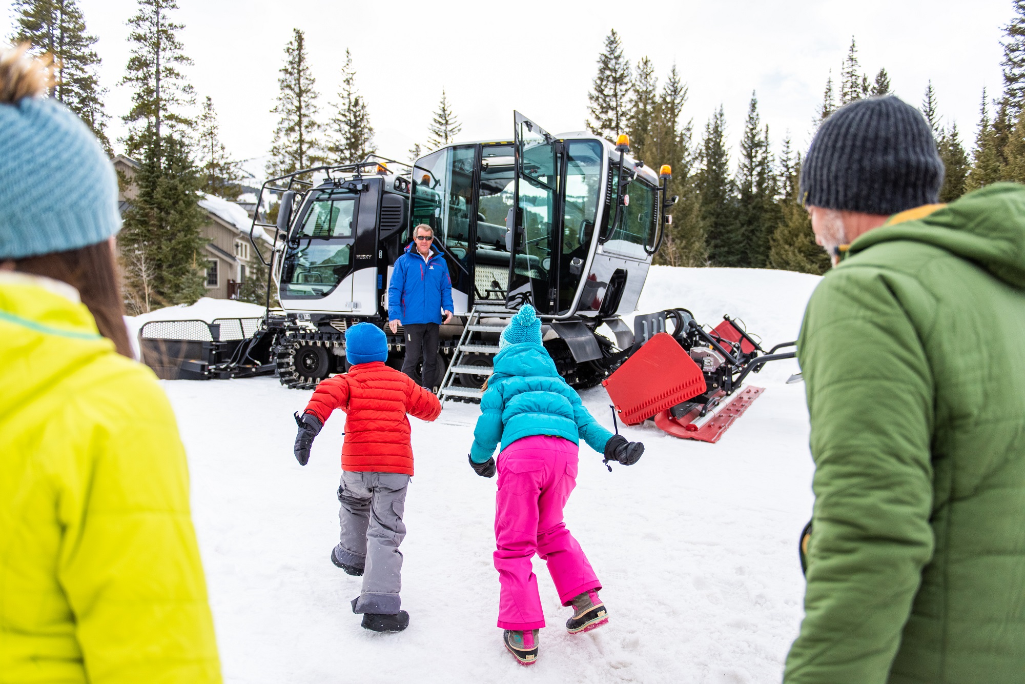 kids run to scenic snowcat tour in Breckenridge, CO