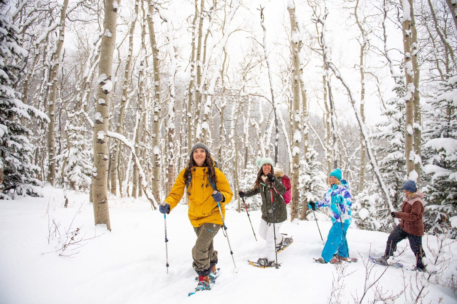 group enjoying a hike in the snow