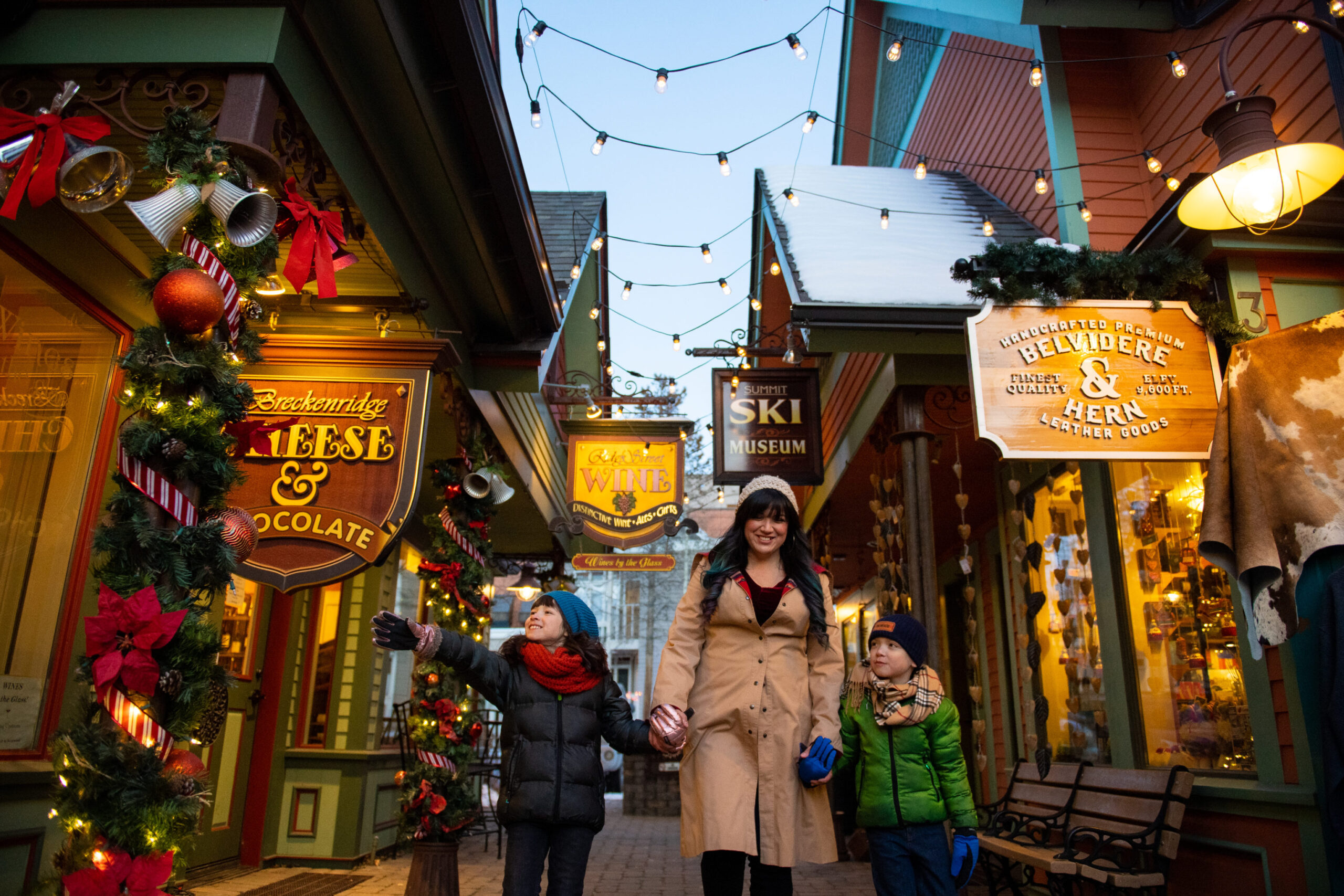 family walking by shops in Breckenridge