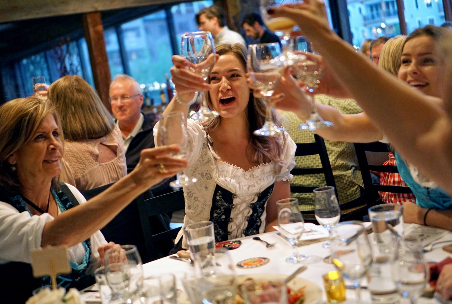 People toasting wine glasses in Breckenridge
