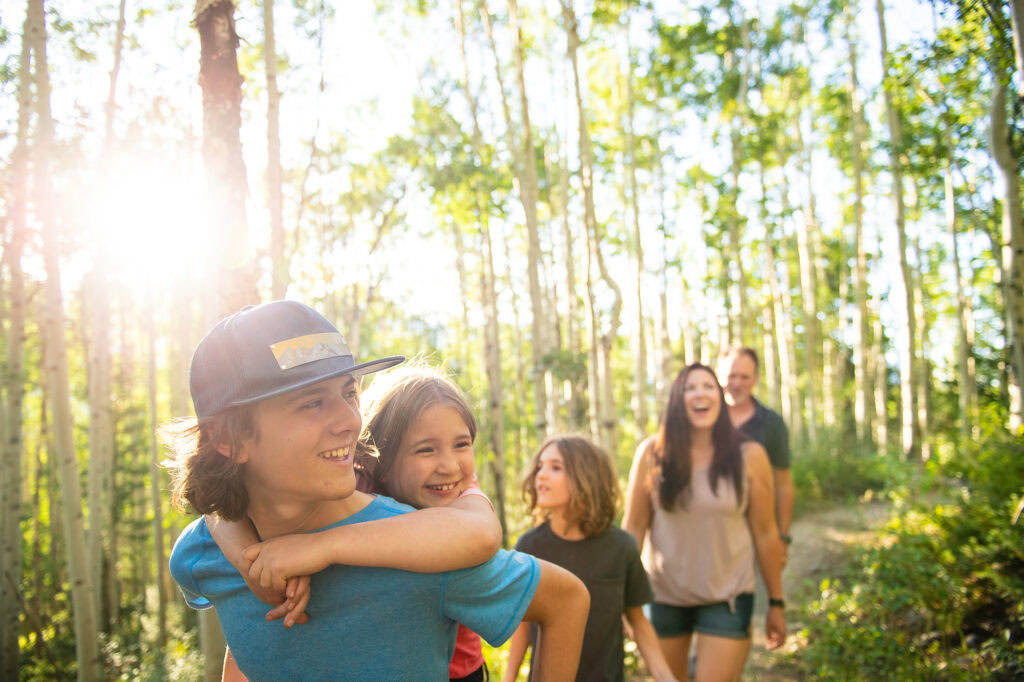 A happy family hiking in Breckenridge