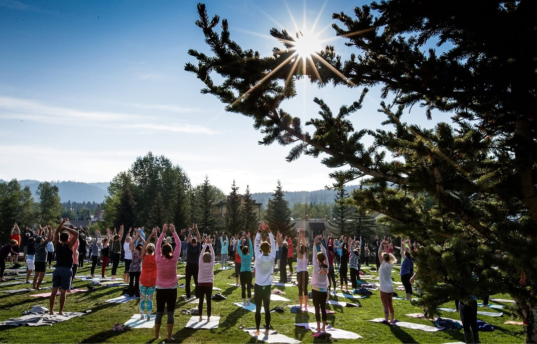 large group doing yoga