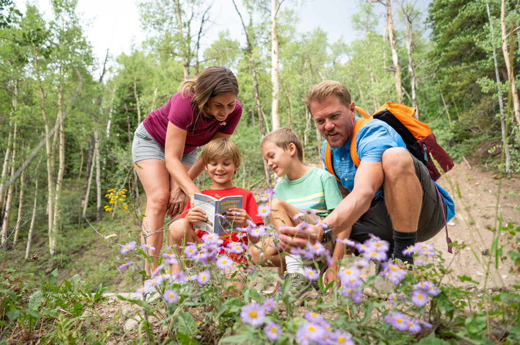 family identifying flowers together