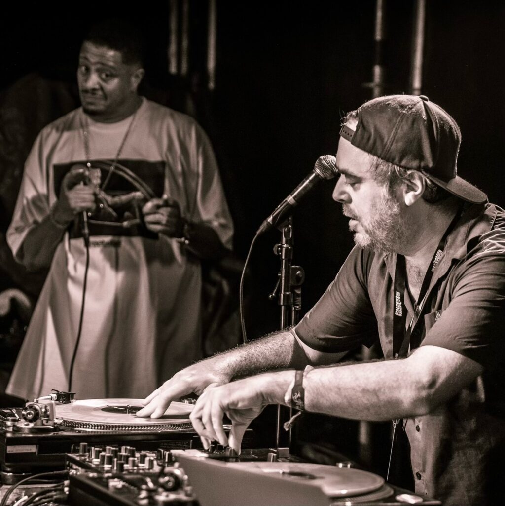DJ performing live at a music event in Breckenridge, Colorado, with a focus on electronic music and nightlife.